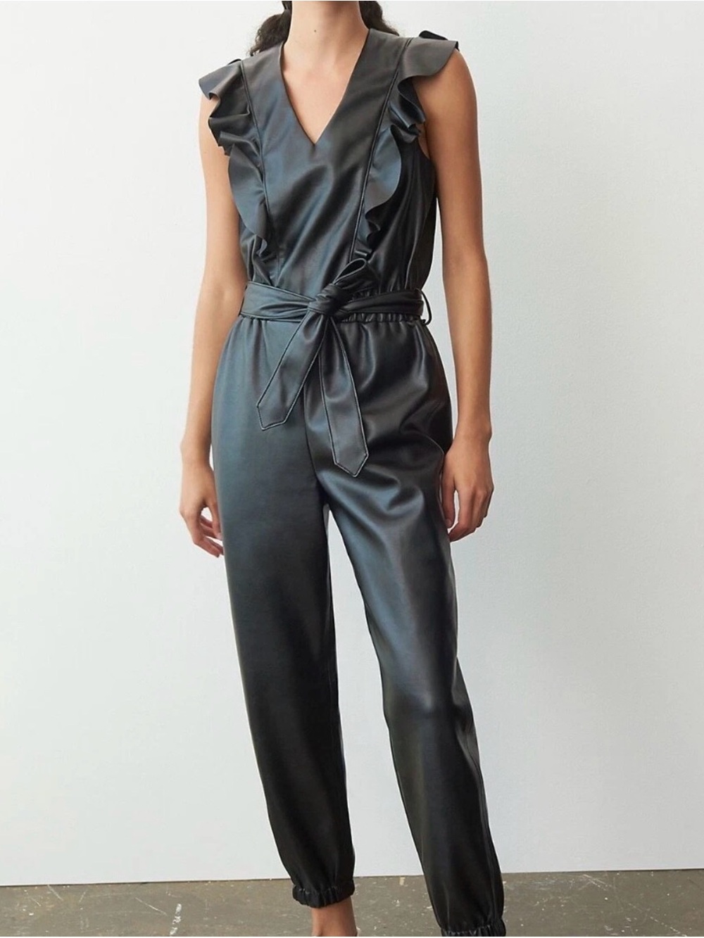 Blank NYC Black Faux Leather Ruffle V-Neck Jumpsuit with Belt